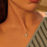 Blue spinel heart necklace